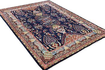 A Kashmar carpet, c. 356 x 260 cm.