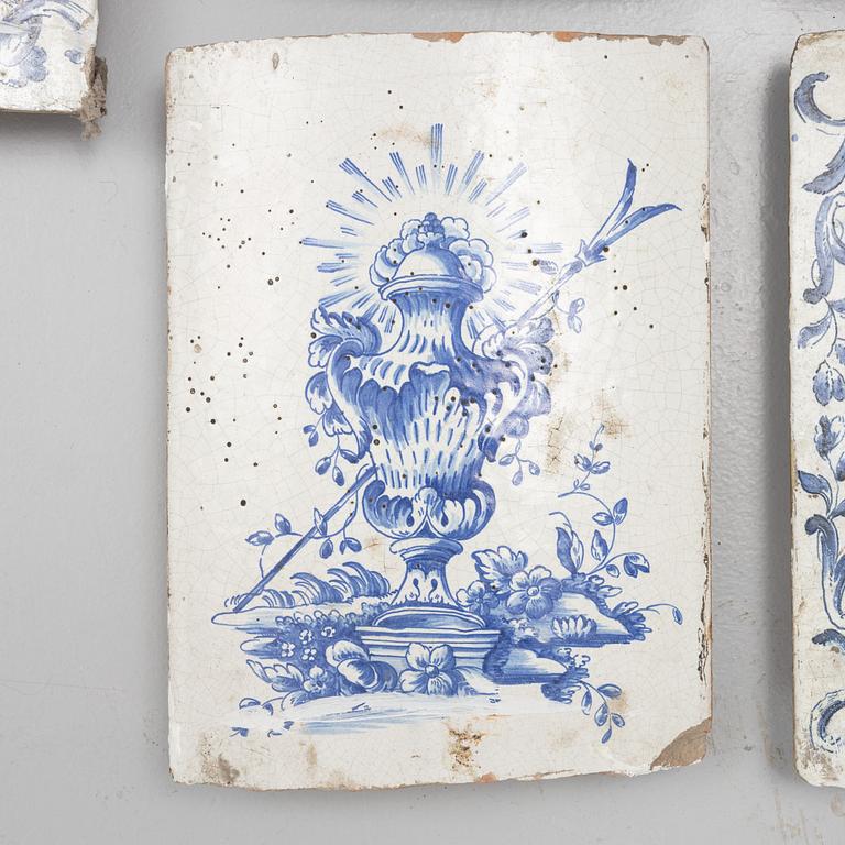 Eleven glazed earthenware tiles, 18th century.