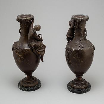 A pair of zinc and marble vases by Francois Moreau, France, ca 1900.