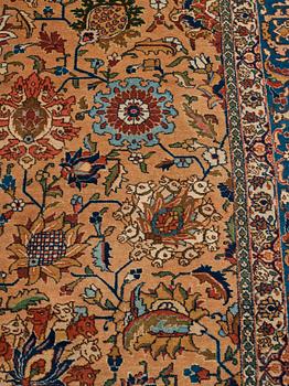 A carpet, semi-antique Tabriz, ca 404 x 292 cm.