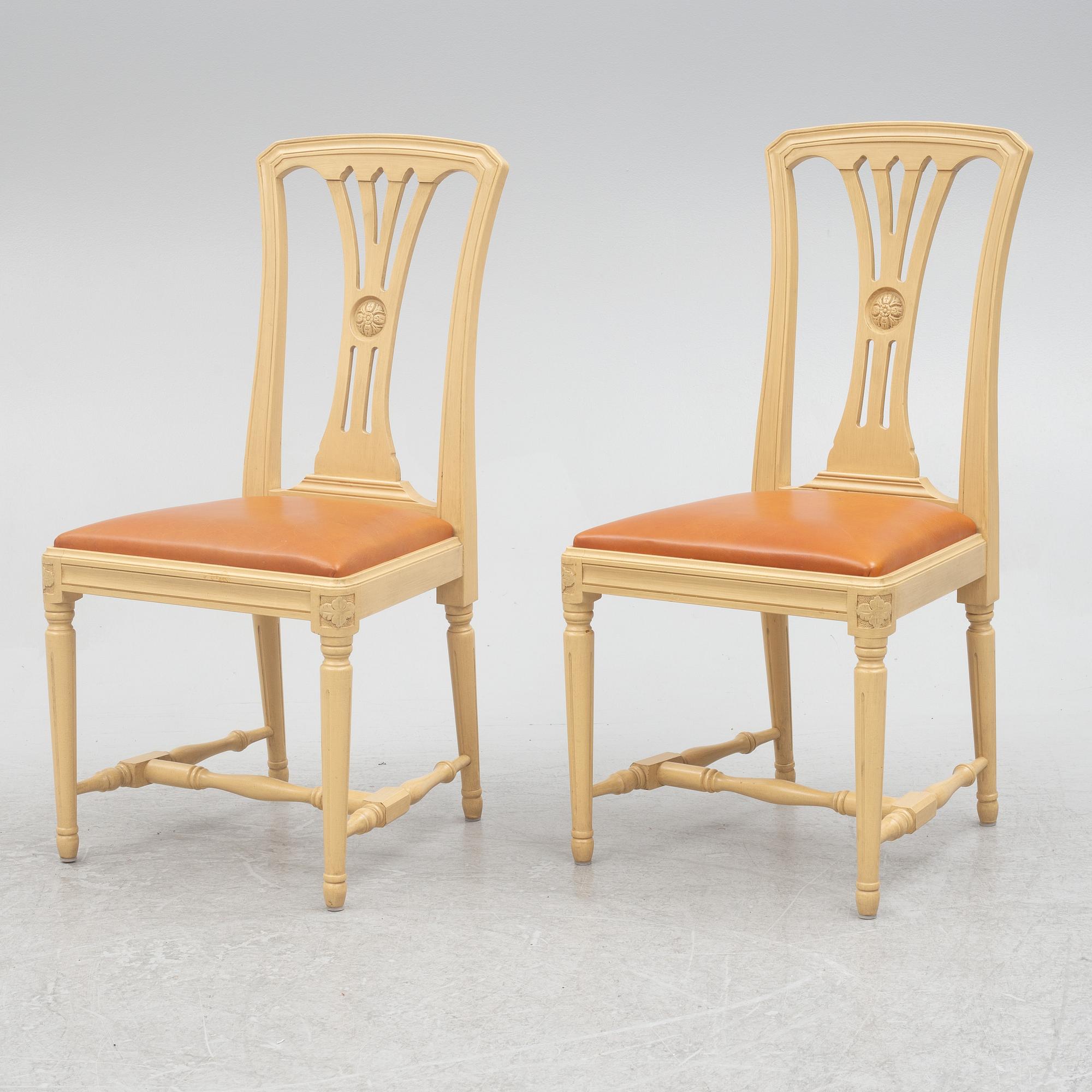 A Gustavian style dining table with six dining chairs, Sweden, 21st century.