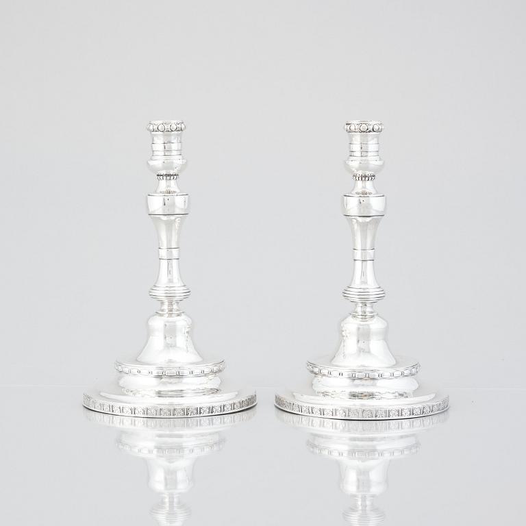 A pair of Swedish Rococo silver candlesticks, mark of Pehr Zethelius, Stockholm 1775.