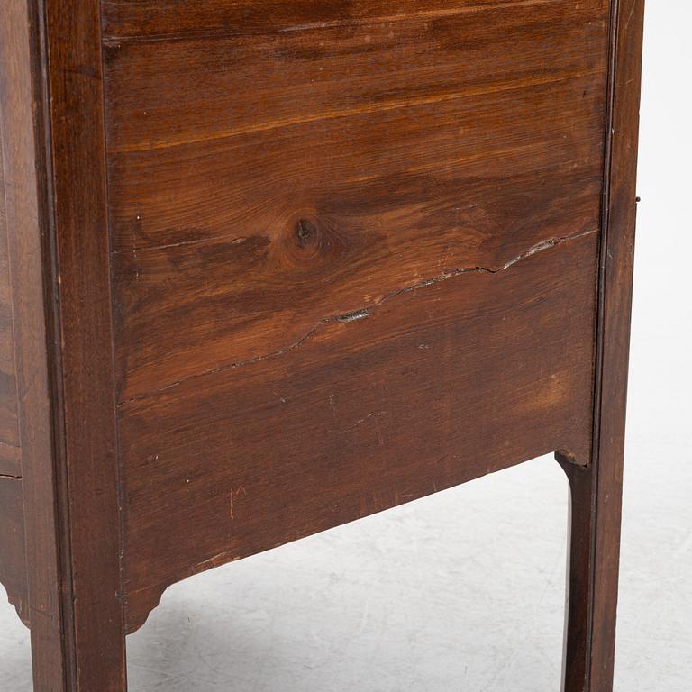 A mahogany bedside table, England, around 1900.