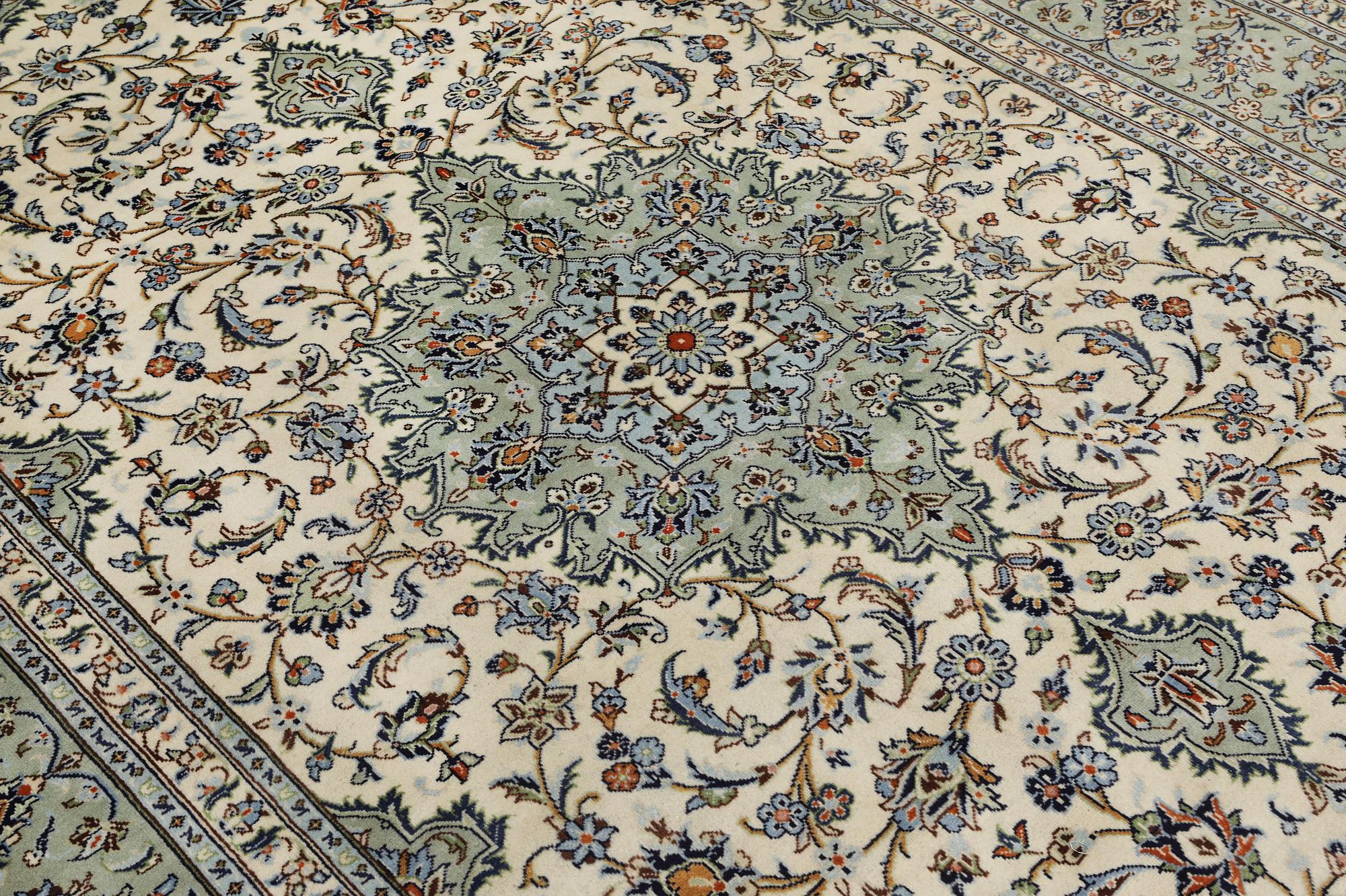 A Keshan carpet, 310 x 206 cm.