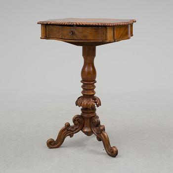 A mid 19th century sewing table.