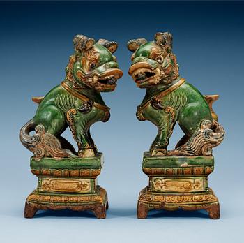 1663. A pair of seated Buddhist lions, 17th Century.