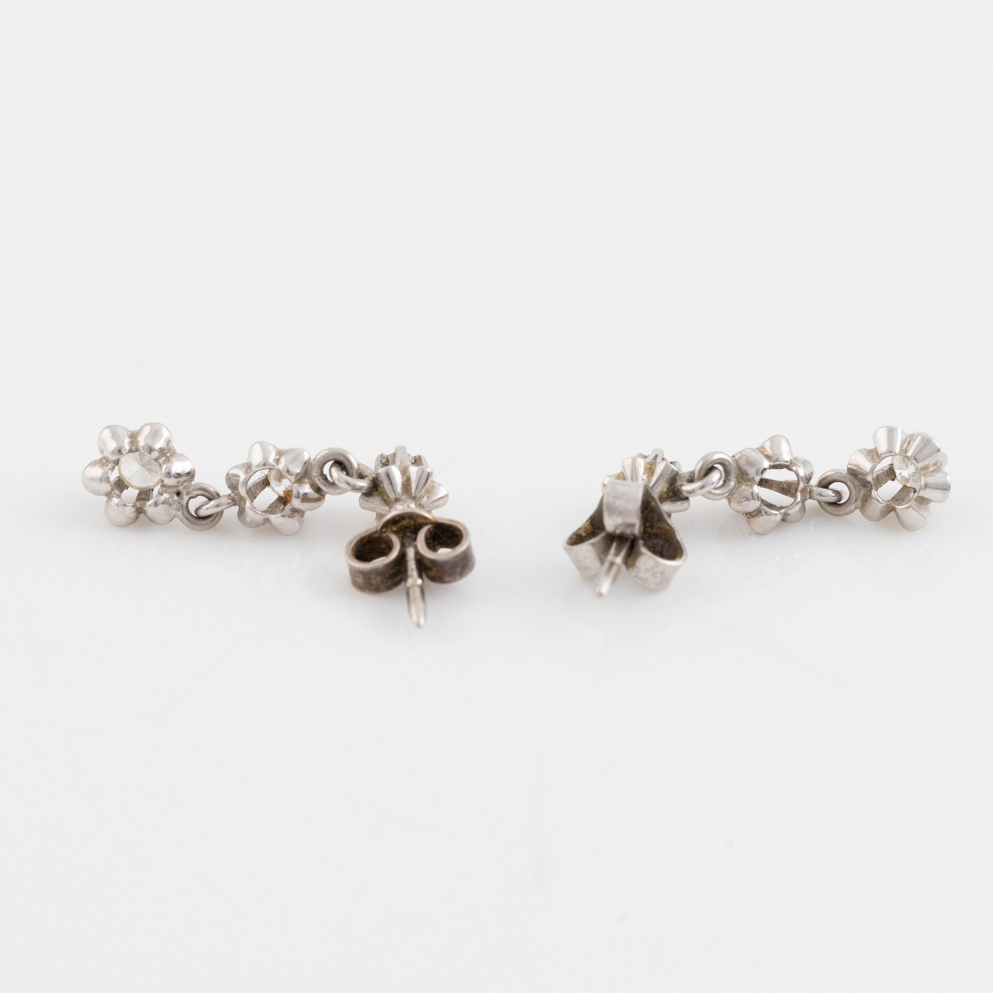 Brilliant cut diamond earrings.