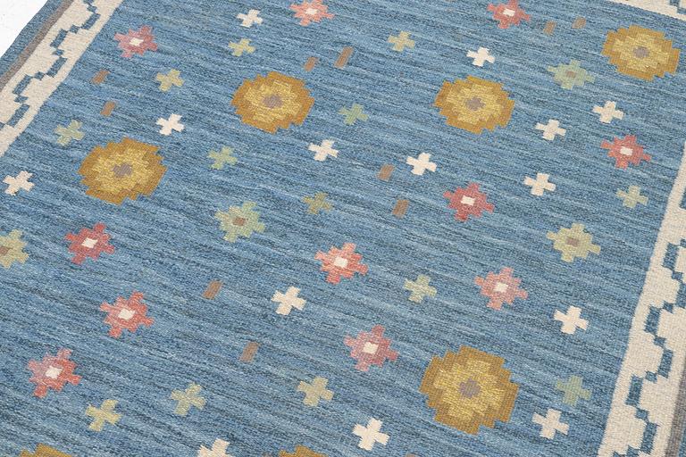 Anna-Greta Sjöqvist, a 'Blomsteräng' carpet, flat weave, c. 240 x 170 cm, signed AGS.