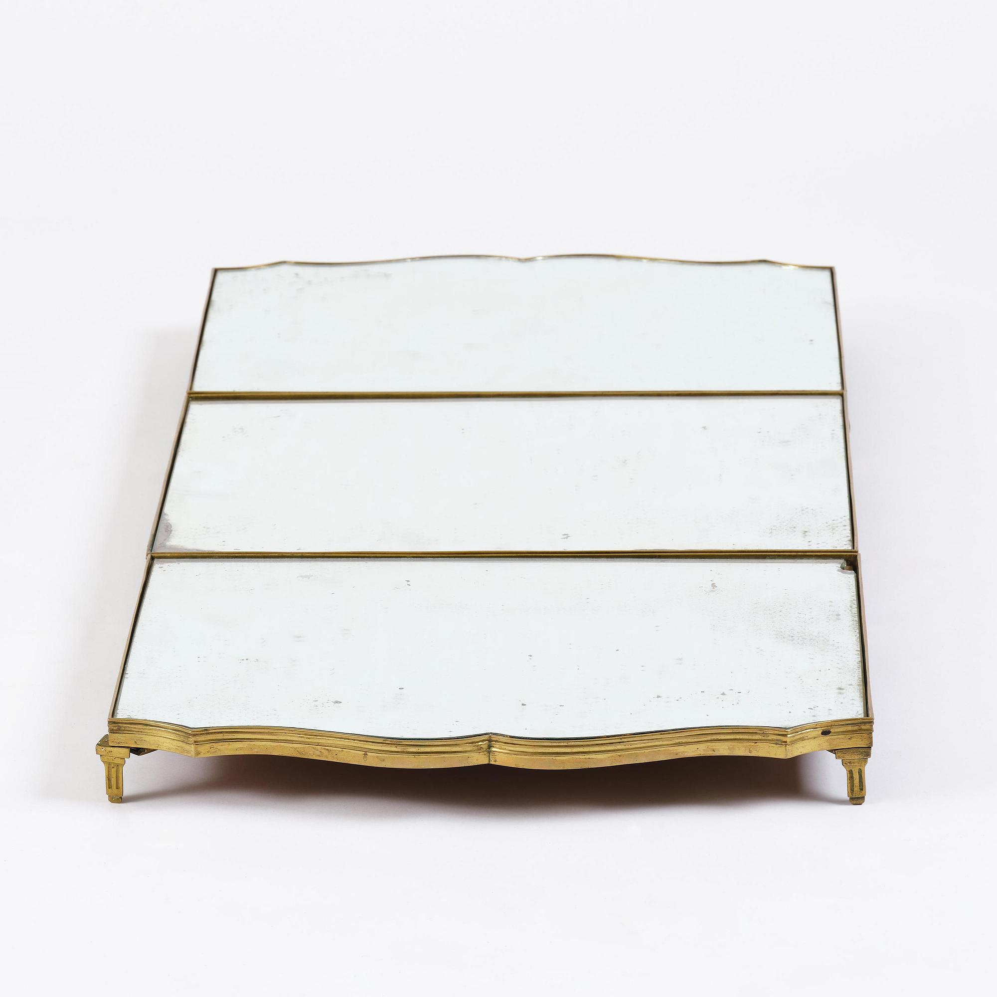 A Gustavian three-piece brass and glass surtout de table, Stockholm, later part 18th century.