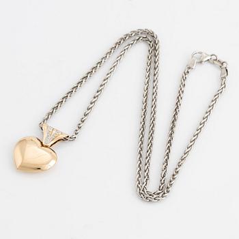 Small diamond heart necklace.