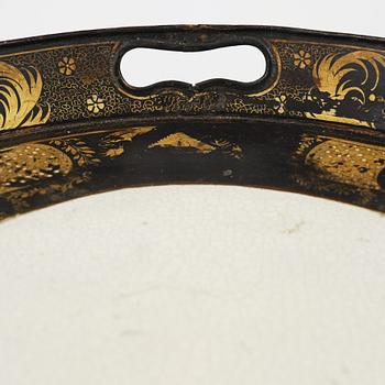 A tole-peinte Empire tray, first part 19th century on a later stand.