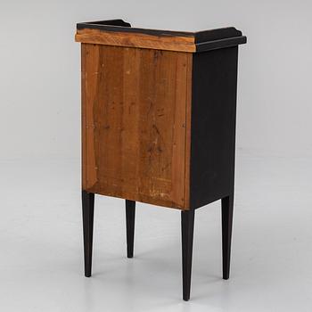 A gustavian style bedside table, mid 20th century.