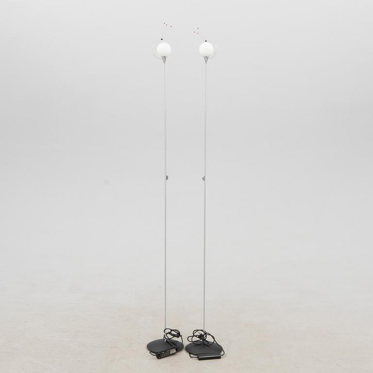 Floor lamps, a pair from Oligo Germany, 21st century.