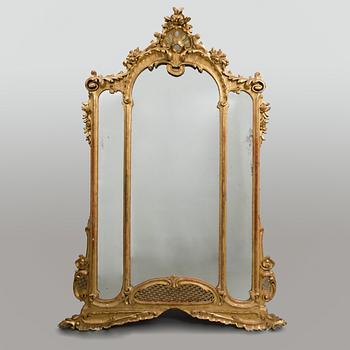 A late 19th century mirror in rococo style.