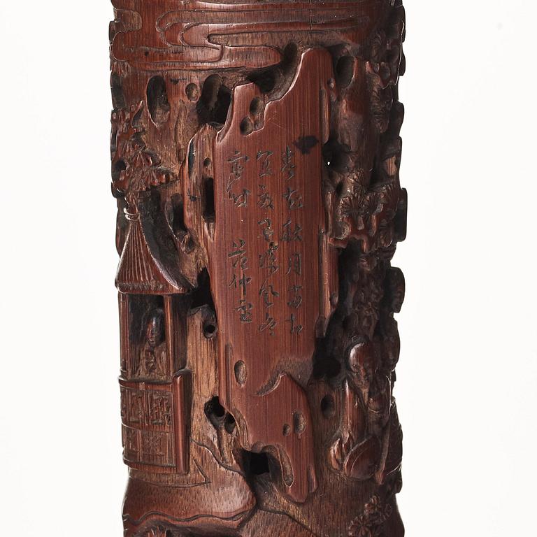 A carved cylindrical bambo parfumier, Qing dynasty, 19th Century.
