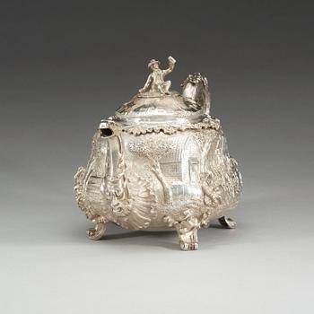An English 19th century parcel-gilt tea-pot, marks of John Samuel Hunt, London 1849.