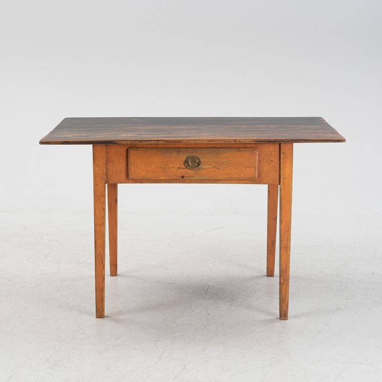 A painted pine table, 19th Century.