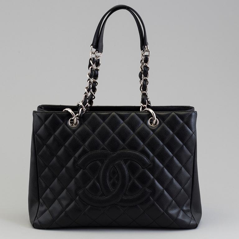 A black caviar "Shopper tote bag" by Chanel 2017.