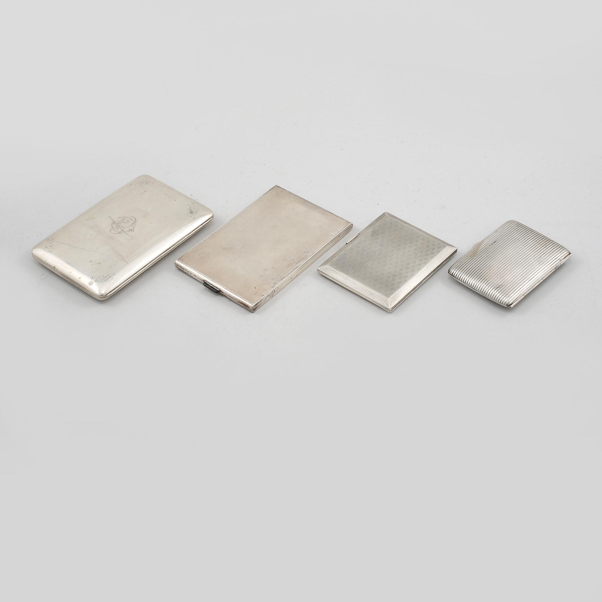CIGARETTETUIER, 4 st, silver, delvis England, 1900-talets första hälft, vikt 485 gram.