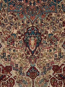 A RUG. An antique Esfahan. 212 x 141 cm.