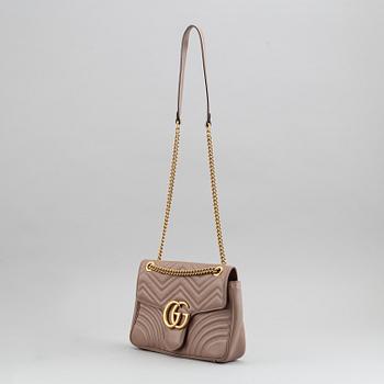 Gucci, a matelassé leather 'Marmont Medium' sholder bag.