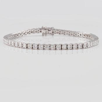 ARMBAND, 18K vitguld med briljantslipade diamanter ca 5.13 ct. Vikt 12,3 gram.