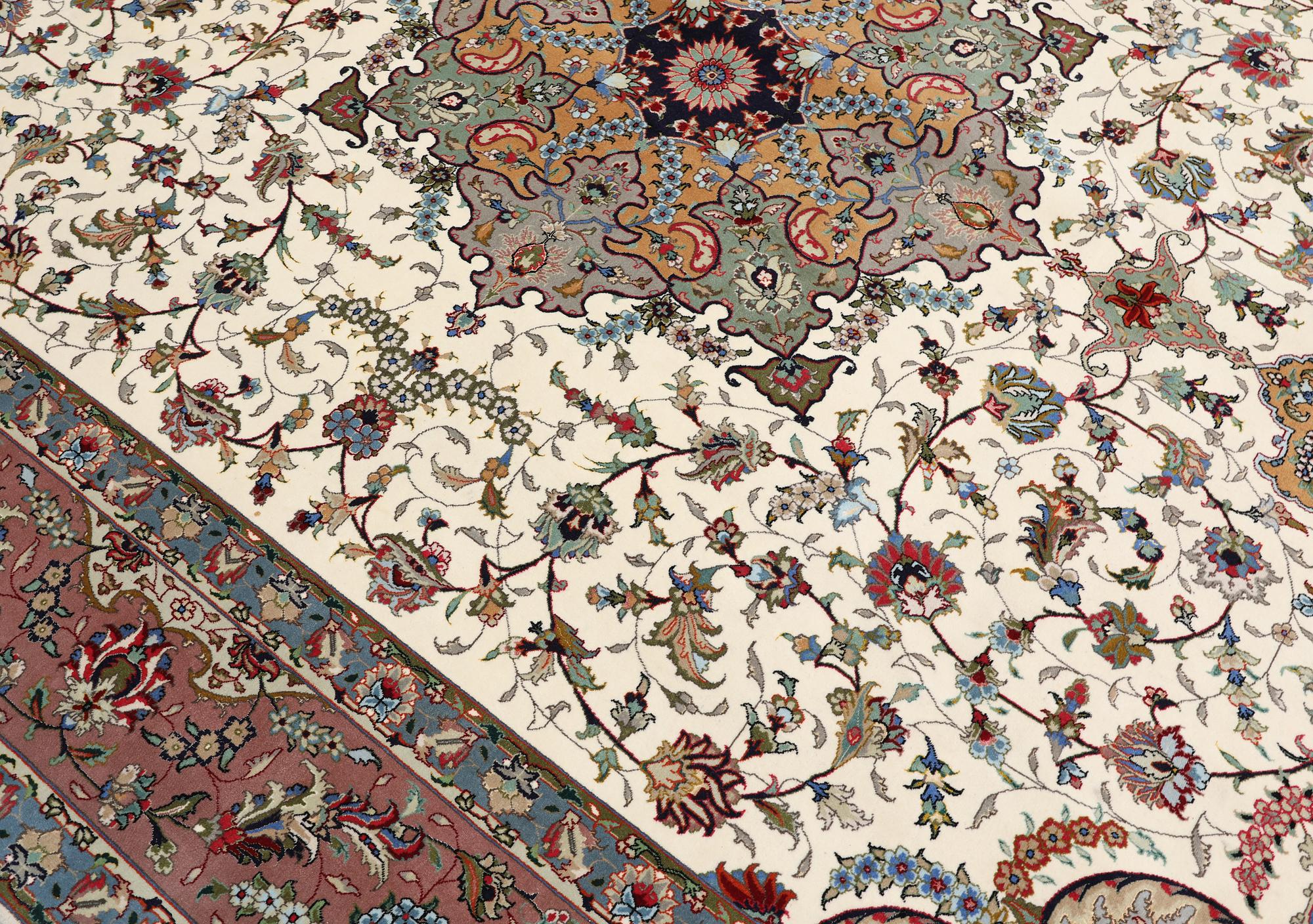 A part silk Tabriz carpet, so-called 50 Raj, approx. 356 x 250 cm.