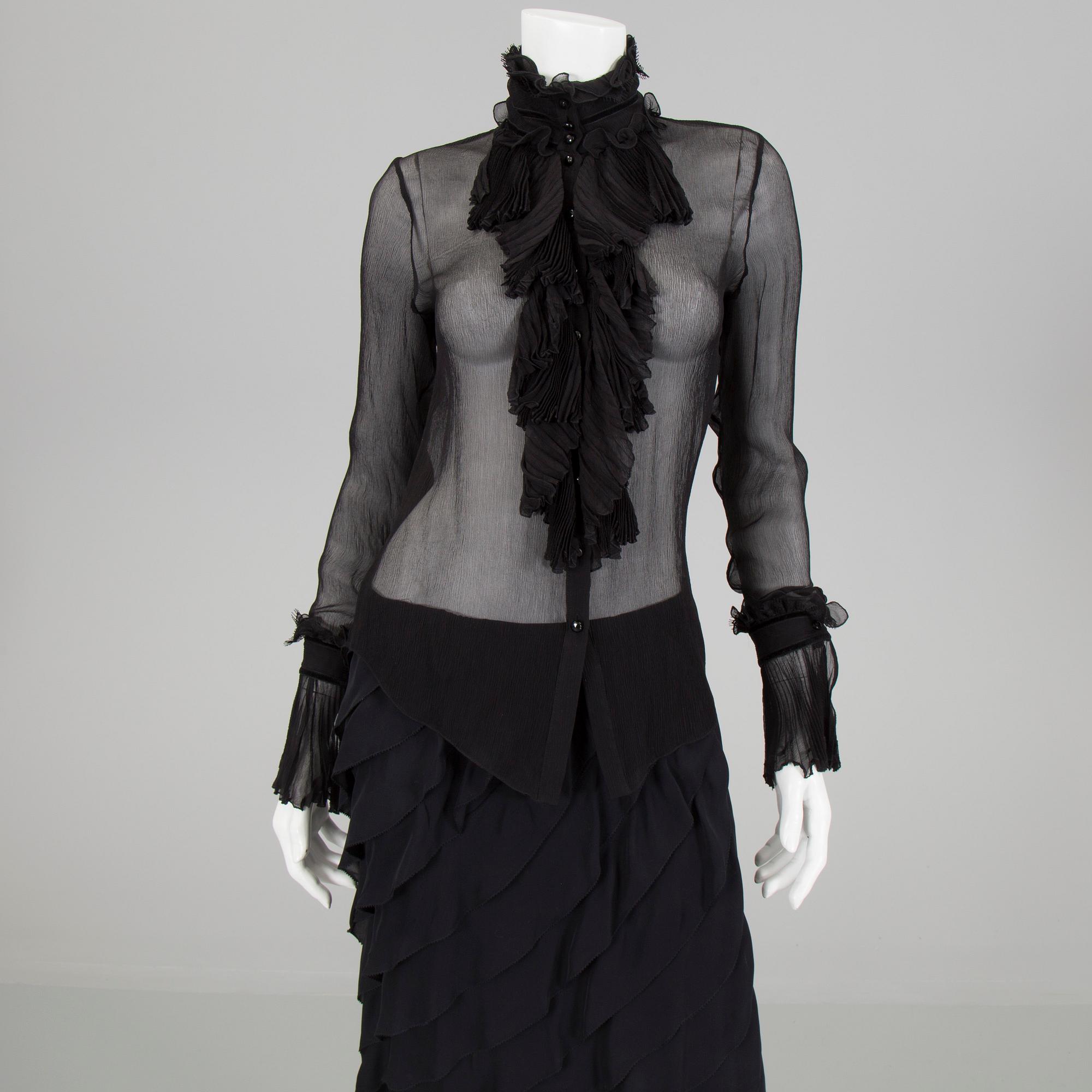 A skirt, topp and a blause by Ralph Lauren.