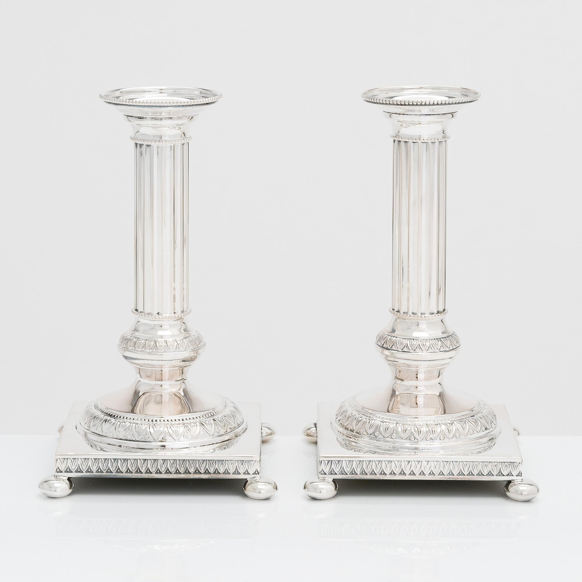 A pair of silver candlesticks, Kultateollisuus, Turku 1985 and 1990.