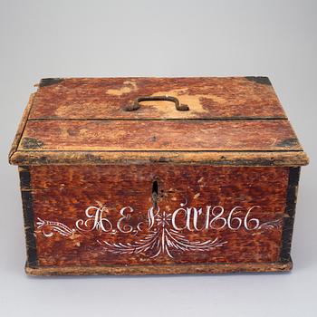 A folk wood box dated 1866.