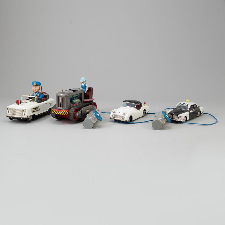 4 toy cars including Bandai and Nomura toys, Japan 1950's-60's.