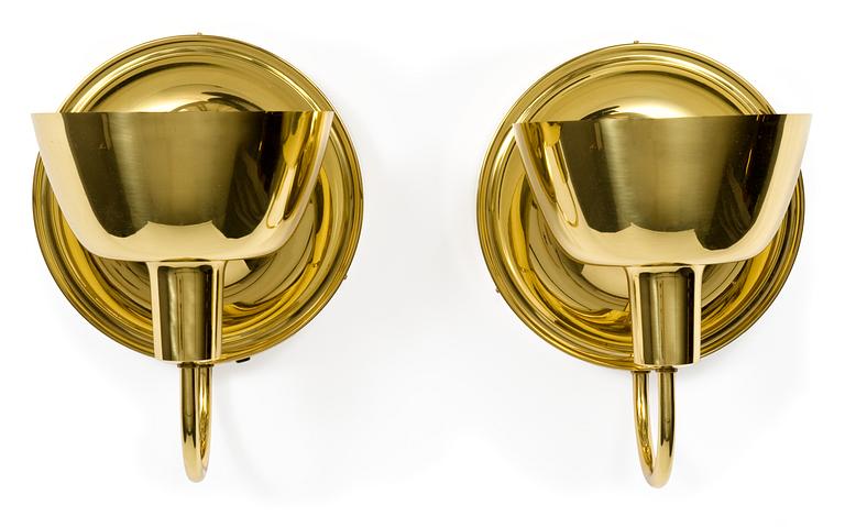 A pair of Josef Frank brass wall lamps, Firma Svenskt Tenn.