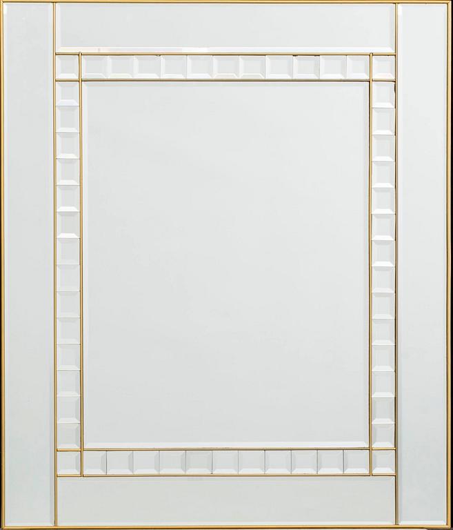 A BRASS WALL MIRROR.