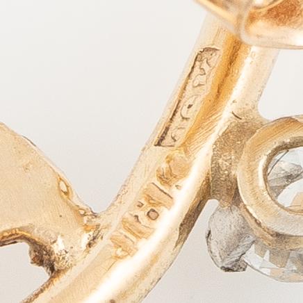 Earrings, 18K gold with six sapphires and two brilliant-cut diamonds.