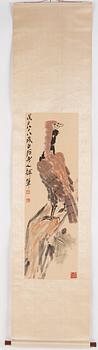 A scroll painting depicting a bird of pray, after Qi Baishi (1868-1957).