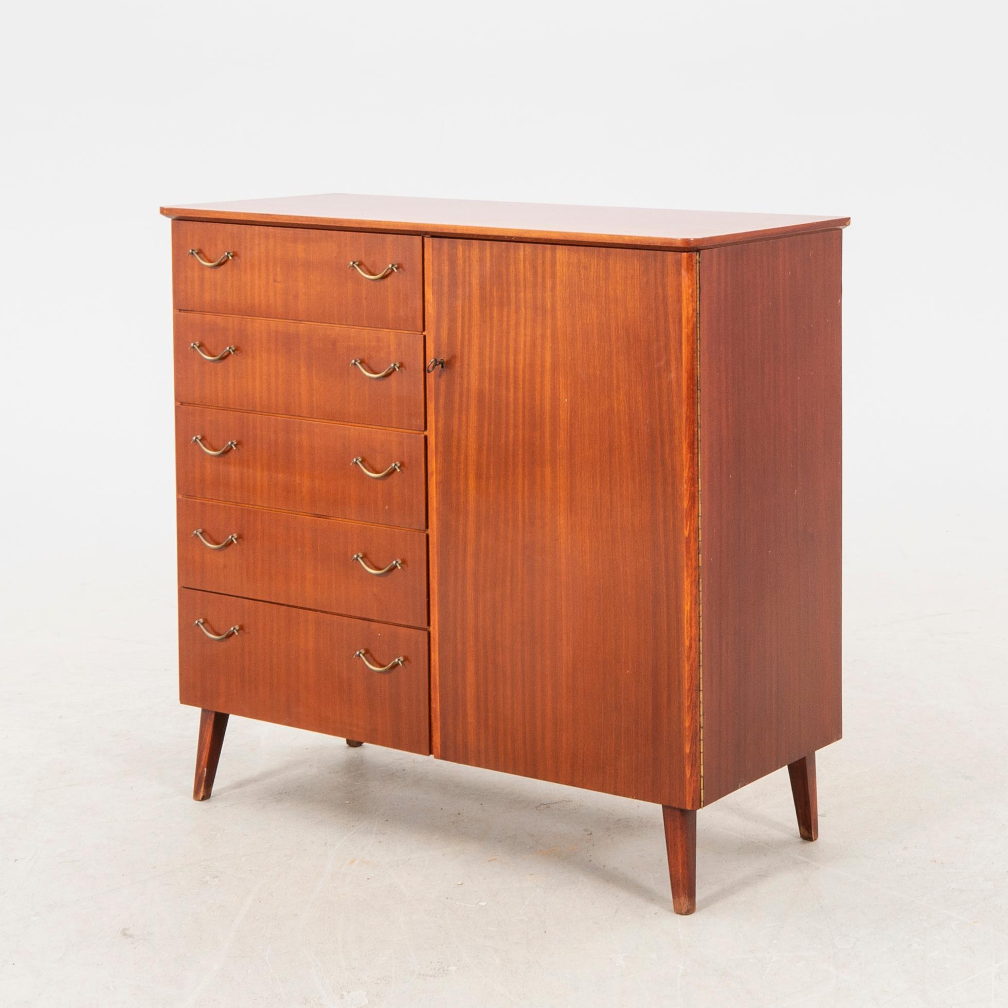 A 1950s teak sideboard/cabinet.