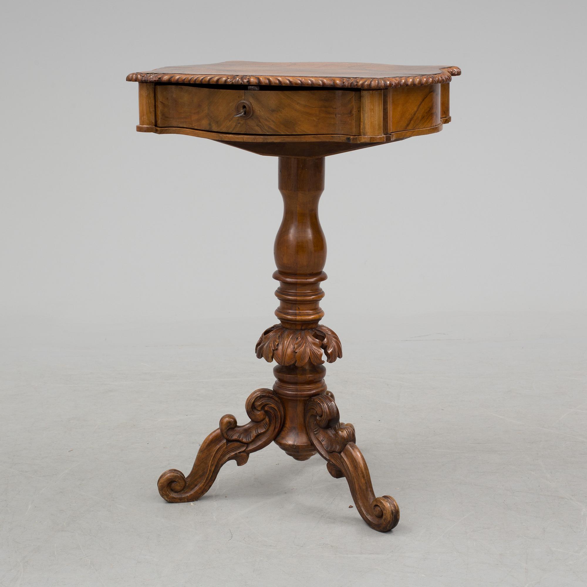 A mid 19th century sewing table.
