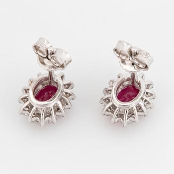 Ruby and brilliant-cut diamond earrings.