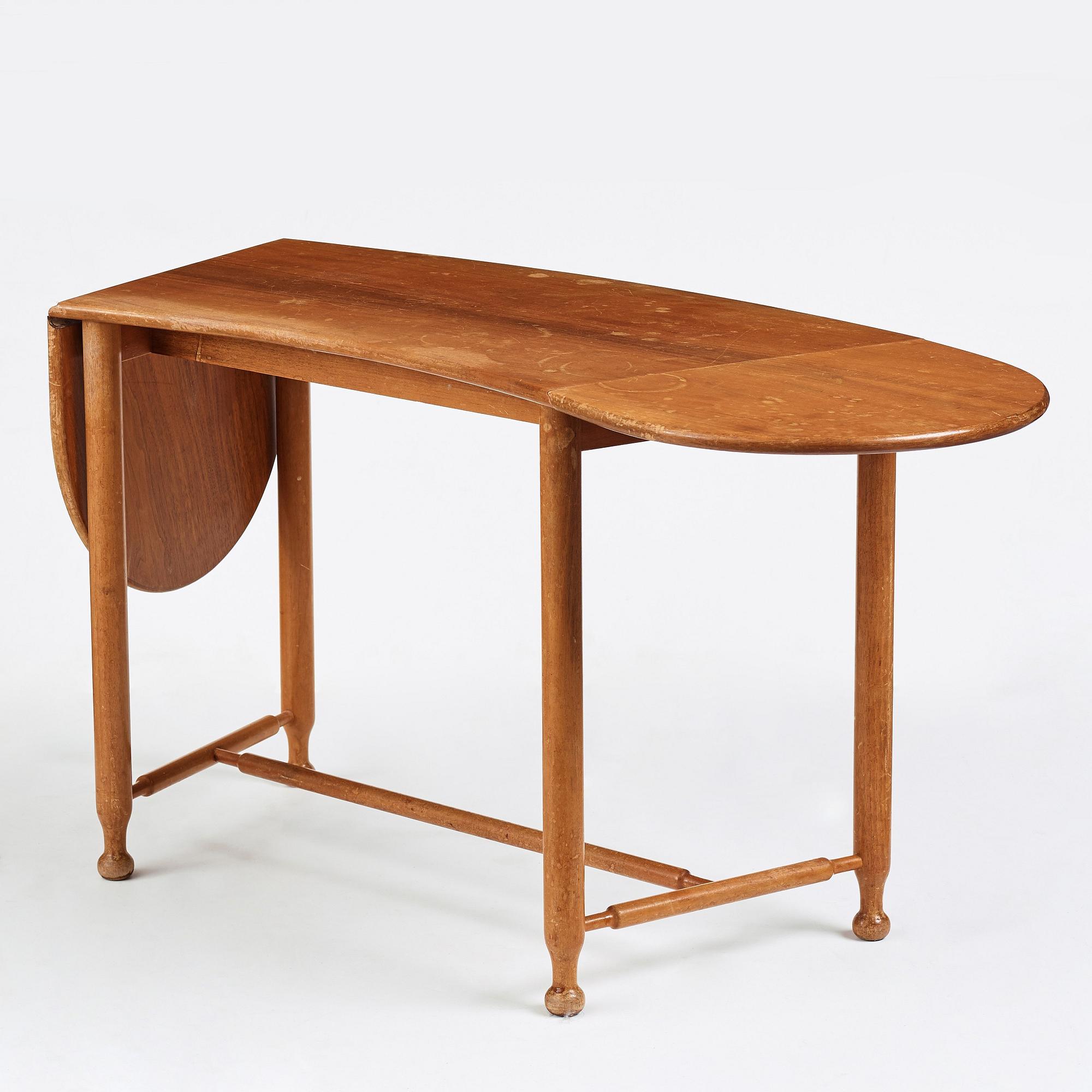 Josef Frank, sidobord med klaffar, Firma Svenskt Tenn, modell 1133, 1900-talets mitt, proveniens Estrid Ericson.
