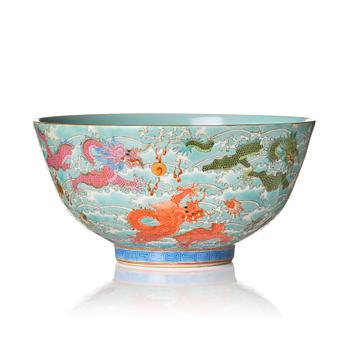 1027. A Chinese nine dragon bowl, presumably Republic, 20th Century.