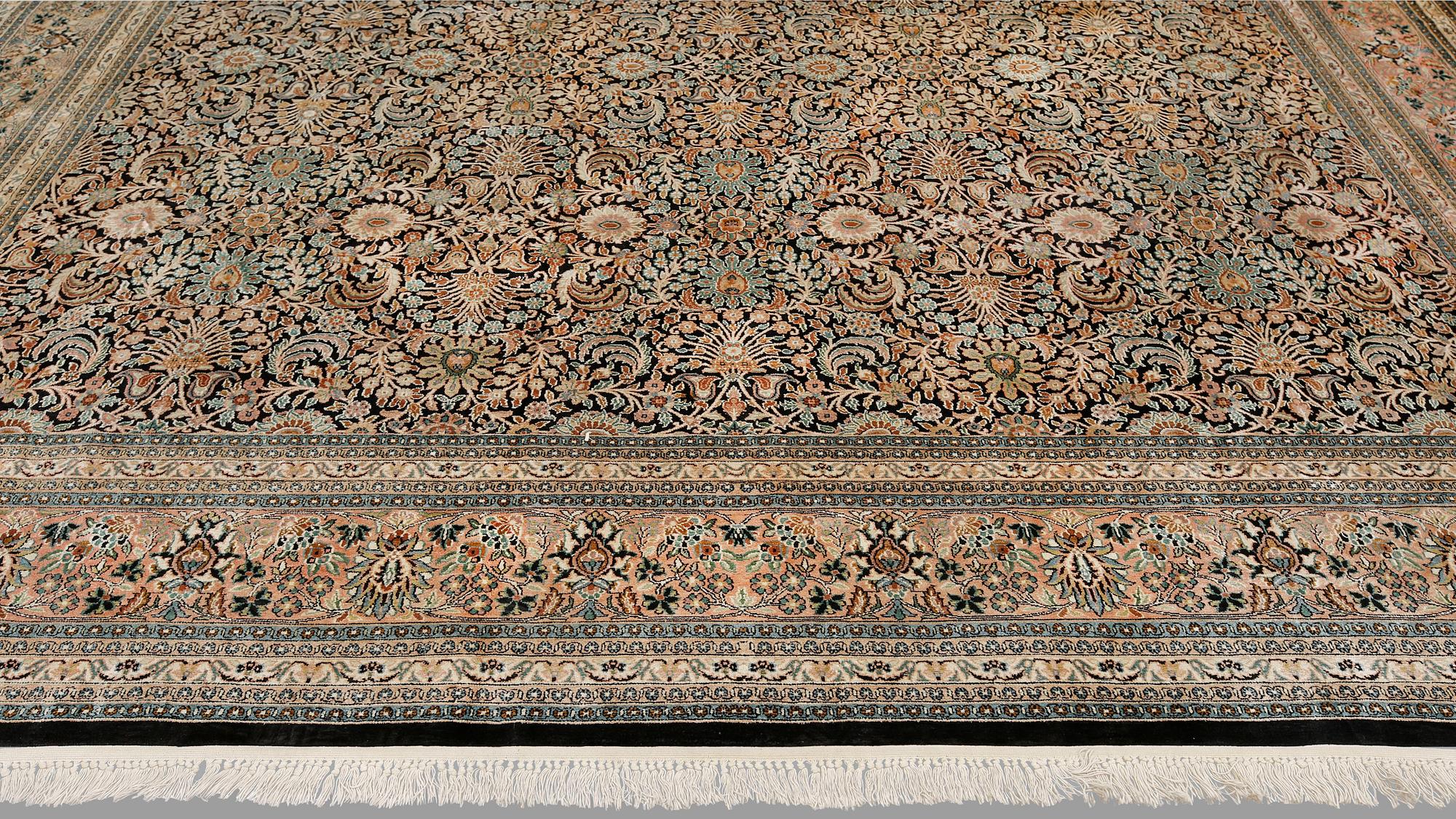 A silk carpet, Kashmir, approx. 580 x 362 cm.