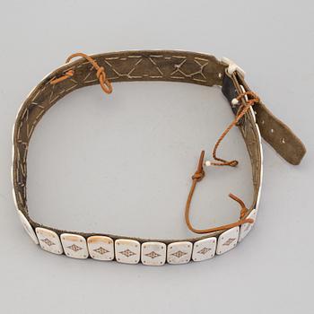 A traditional sami belt probably by Per Anders Nutti. Signed with a monogram.