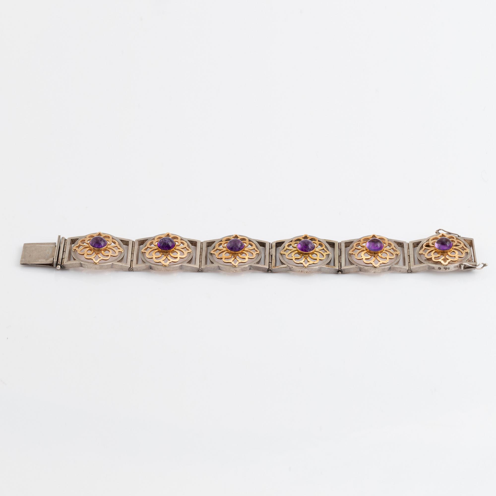 Silver and 18K gold with cabochon cut amethyst necklace.