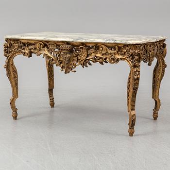 A second half of the 20th Century bronzed table with a marble top.