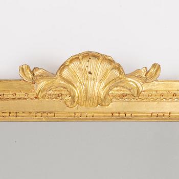 A "Meunier" mirror wall lamp from IKEA's 18th-century series, late 20th century.