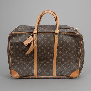 251. Louis Vuitton, LOUIS VUITTON, a monogram canvas travelbag, "Sirius 45".