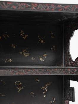 A lacquer display cabinet, late 19th century.