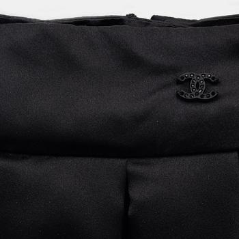 Chanel, a black silk skirt with a collar/top, size 34.