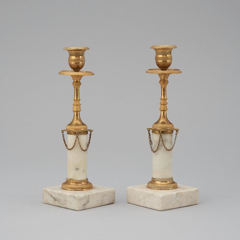 A pair of late Gustavian late 18th century candlesticks.