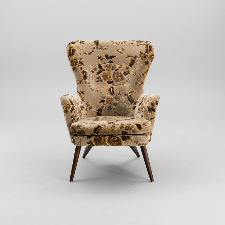 A mid-20th century armchair for Puunveisto Oy - Träsnideri Ab.